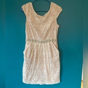 Blush lace dress with beaded belt and pockets
